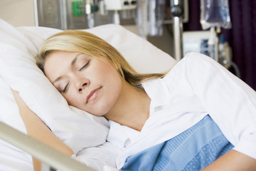 Woman Asleep In Hospital Bed