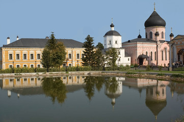 Naklejka premium monastery is reflected in lake with water