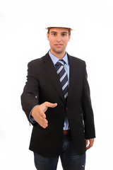 young man in suit offering to shake the hand, isolated