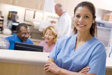 Doctors And Nurses At The Reception Area Of A Hospital