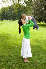 happy family on green meadow