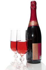 Two glasses with red champagne and a bottle, isolated