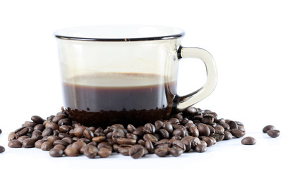 Cup with coffee, costing on coffee grain.