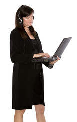 brunette model holding computer on white isolated background