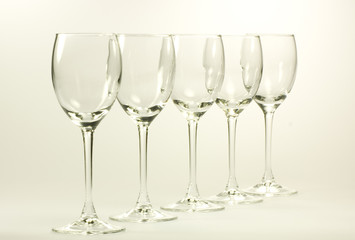 Empty cognac glasses set isolated on white background