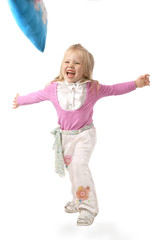 Portrait of the girl in a pink jacket and white trousers