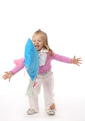 Portrait of the girl in a pink jacket and white trousers