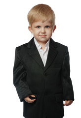 The boy in a suit. It is isolated on a white background