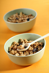 bowls full of musli with milk, healthy breakfast.