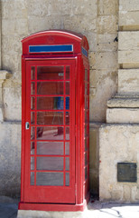 red british style old telephone booth medieval city malta mdina