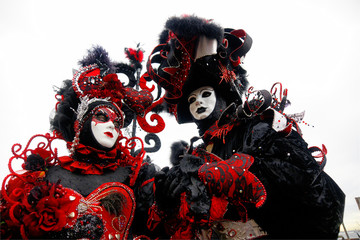 Two Red and Black masks in Venice, Italy.