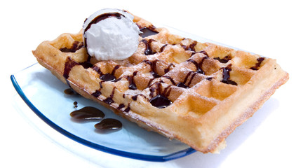 waffle with cream and chocolate syrup.