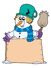 Snowman with sign and broom