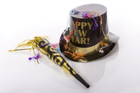 Top hat that says happy new year and other party favors