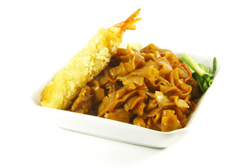 Thai Spicy Fried Noodles On a White Dish Plate