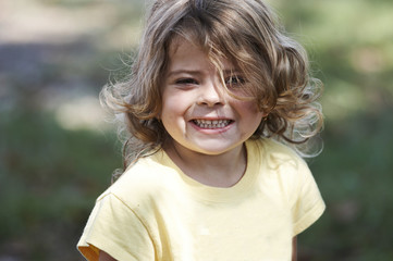 a picture of a cute little girl smiling