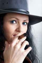 An image of nice woman with cigar