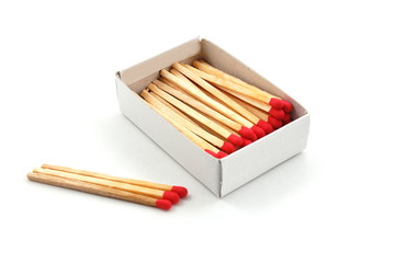 Some red matches isolated on a white background.