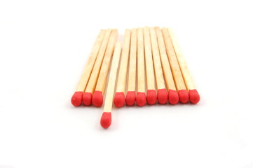 Some red matches isolated on a white background.