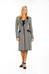 Young blonde woman in fashionable dress