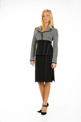 Young blonde woman in fashionable dress