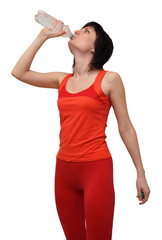 Woman in sports outfit drinking water