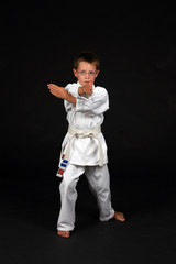 karate student demonstrating hand block and right stance