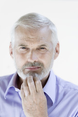 thinking expressive senior