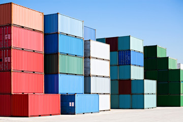 cargo shipping containers stacked at harbor freight terminal - 9417752