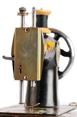 Old sewing machine on a isolated