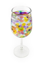 colored bubbles in a wine glass