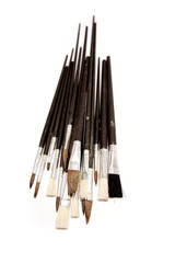 Paintbrushes over white