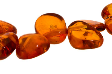 amber necklace on white background