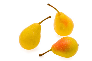 ripe pears with drop of water on white background