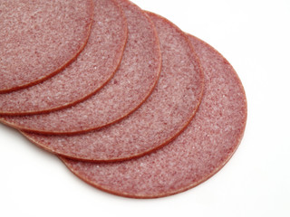 arranged slices of sausage
