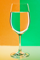 the refraction of the scene in goblet with water.