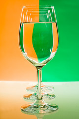 the refraction of the scene in goblet with water.