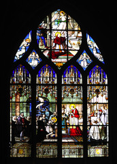 France, Paris: ancient stained-glass window at Saint Severin