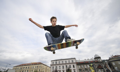 Boy practicing skate in a skate park