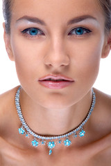 beautiful caucasian blue eyed model in necklace