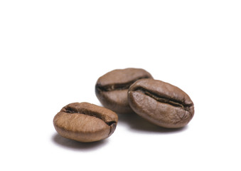 Three coffee beans isolated on white background