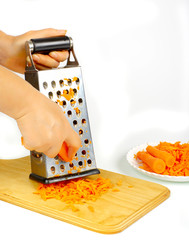 Cooking peppers on cutting boards with stainless grater