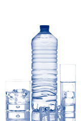 Bottle and glasses of water reflected on white background