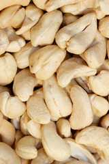 Dried cashew nuts close-up  background