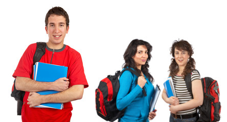 Students with books over a white background. Focus at front