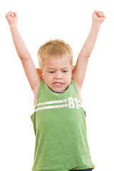 A gorgeous little cute three year old with his arms in the air.