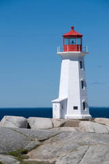 Fototapeta na wymiar The light house in beautiful Peggy's Cove in Nova Scotia