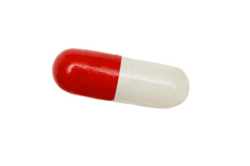 Red and white pill a over white background