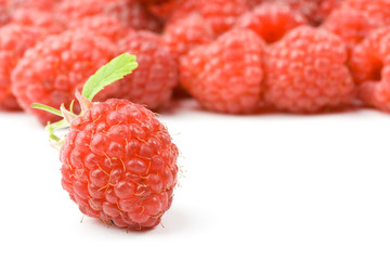 Fresh ripe raspberry on a white background