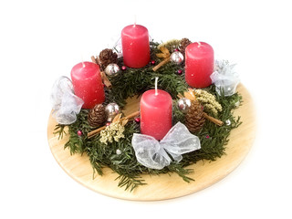 Fototapeta na wymiar Christmas wreath with candles isolated on white background